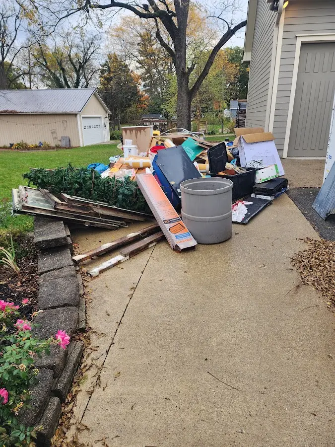 Dumpster being loaded with debris for Demolition Dumpster Rental in Perkiomen